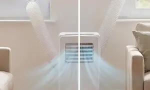 Aire acondicionado portátil expulsando aire fresco. Su diseño compacto y potente lo hace ideal para cualquier habitación.