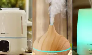 Tres dispositivos: un humidificador blanco con panel de control, un difusor de madera con vapor y un humidificador/purificador iluminado en verde.