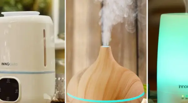 Tres dispositivos: un humidificador blanco con panel de control, un difusor de madera con vapor y un humidificador/purificador iluminado en verde.